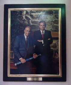 The portrait of the Marriott's that looks over the reception desk of their hotels